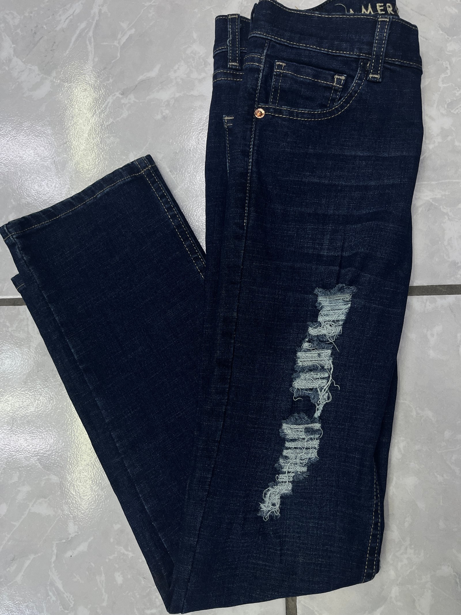 Pantalón Rasgado